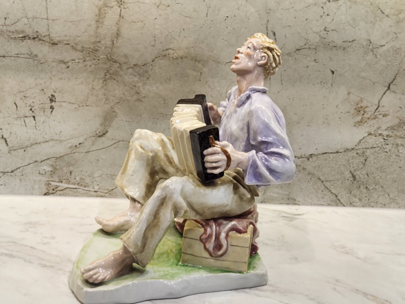 Decorative Figurine of a Boy, Handcrafted Ceramic Sculpture